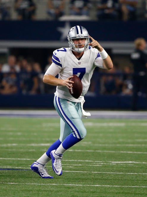 Dallas Cowboys quarterback Cooper Rush (7) scrambles out of the pocket before throwing a pass in the second half of a preseason NFL football game against the Oakland Raiders on Saturday, Aug. 26, 2017, in Arlington, Texas.