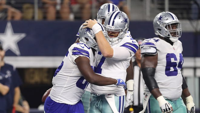 Dallas Cowboys receiver Noah Brown (85) celebrates a third quarter touchdown with quarterback Cooper Rush (7) against the Indianapolis Colts at AT&T Stadium.