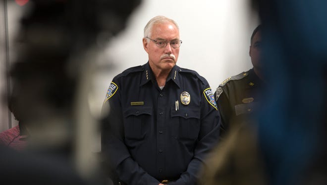 Aztec Police Chief Mike Heal listens during a press conference about the Aztec High School shooting on Friday at the San Juan County Sheriff's Office in Aztec.
