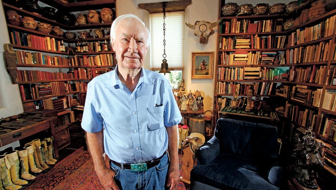 In this July 4, 2014 photo, Forrest Fenn poses at his Santa Fe, N.M., home.
