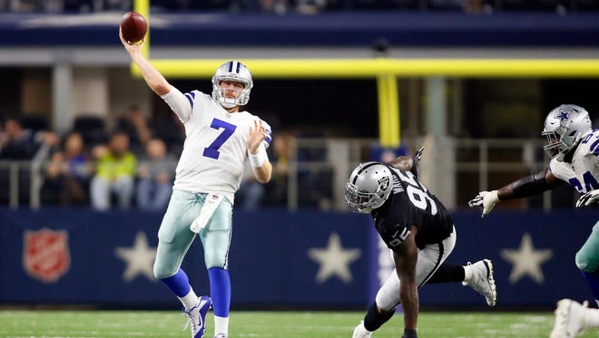 Dallas Cowboys quarterback Cooper Rush (7) throws a touchdown in the fourth quarter against the Oakland Raiders at AT&T Stadium.
