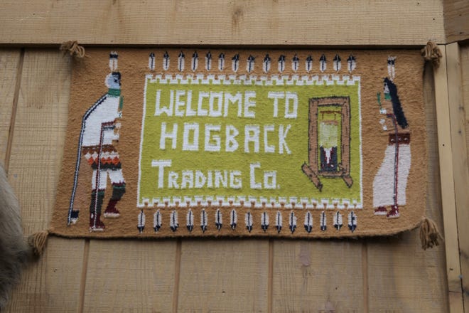 A woven sign greets visitors to the Hogback Trading Co. in Waterflow.