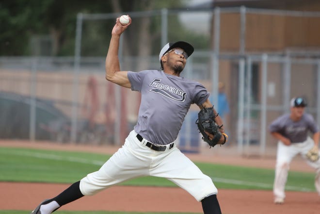 Kelvan Pilot of the Farmington Frackers gets a strikeout against the Colorado Cutthroats during Friday's game at Ricketts Park in Farmington.