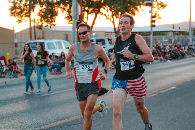 Runners participate in the Electric 5K & One-mile Fun Run before the annual Las Cruces Electric Light Parade on Wednesday, June 3, 2019.
