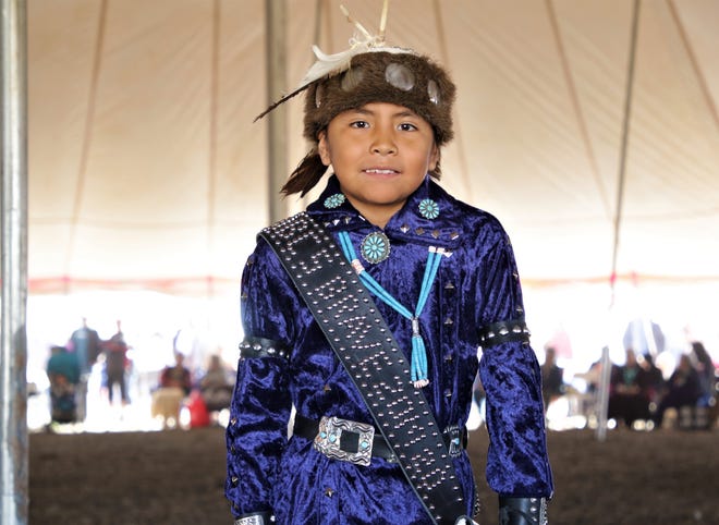 Atsá Biyáázh Community School Brave Trey Etcitty poses for a picture, Thursday, Oct. 3, 2019, during the Northern Navajo Nation Fair in Shiprock.