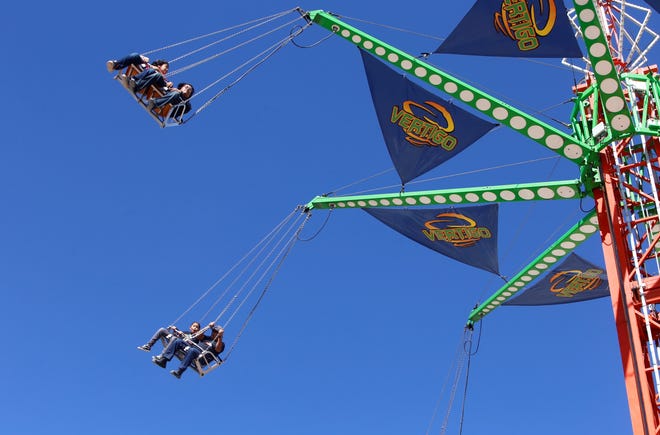 The Vertigo, a giant swing tower that spins, was among the popular attractions at the carnival for the 108th Northern Navajo Nation Fair on Oct. 3 in Shiprock.