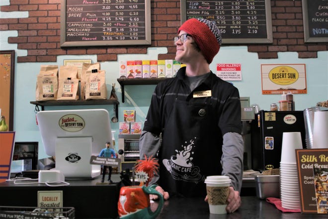 Derek Lovell of Cosmic Café in Farmington calls out a customer's order on Nov. 30, 2019, Small Business Saturday.