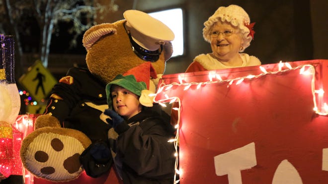 Participants in the Toys for Tots float are seen in Farmington ' s annual Christmas Parade on Dec. 5, 2019.