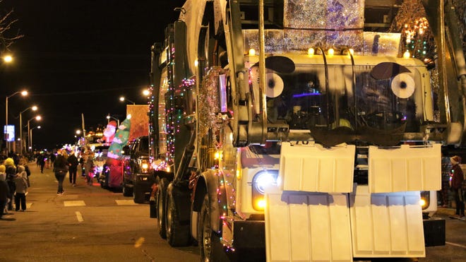 A decorated Waste Management vehicle rolled down Main Street at Farmington ' s annual Christmas Parade in Farmington on Dec. 5, 2019.