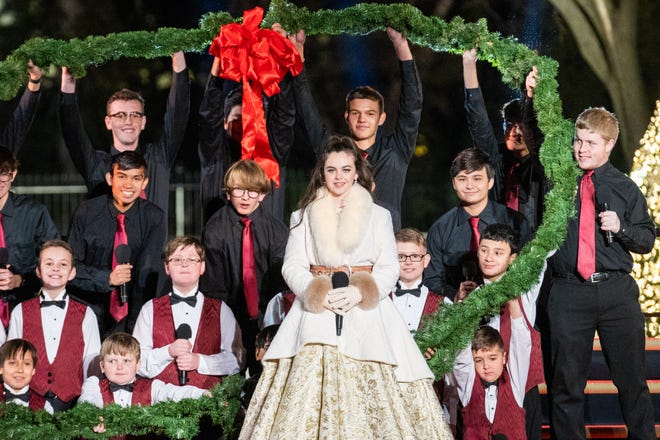 Winner of "The Voice" season 15 singer Chevel Shepherd is seen on stage with other performers at the 2019 National Christmas Tree Lighting Ceremony in Washington.