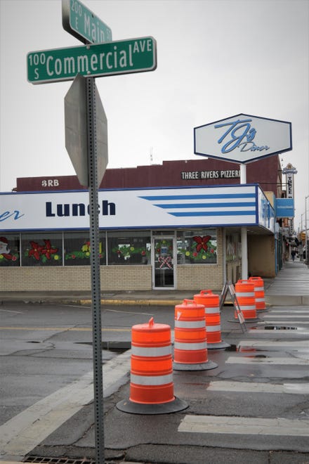 Street closure barrels block access to East Main Street at South Commercial Avenue on Dec. 27, 2019, as preparations for Complete Streets construction got underway.