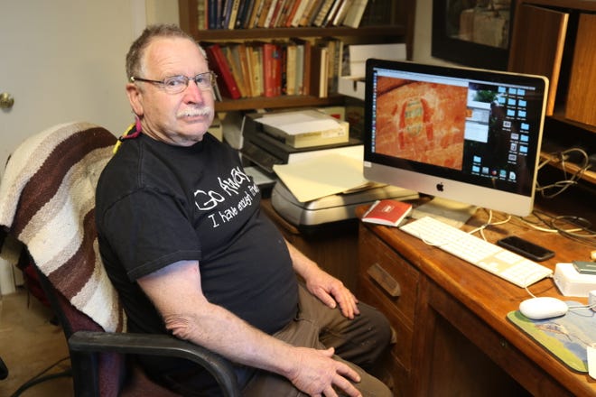 Fred Blackburn, who leads a team conducting a survey of historic inscriptions at Aztec Ruins National Monument, says he hopes to finish documenting the graffiti by the end of this year.