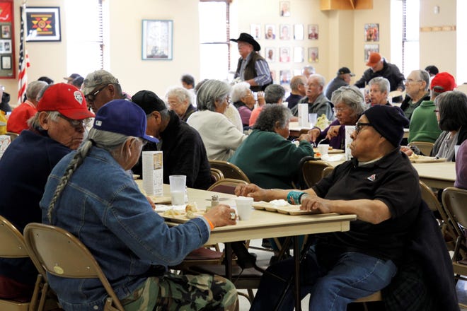 A crowd gathers for lunch, Wednesday, Feb. 19, 2020, at the Bonnie Dallas Senior Center in Farmington.
