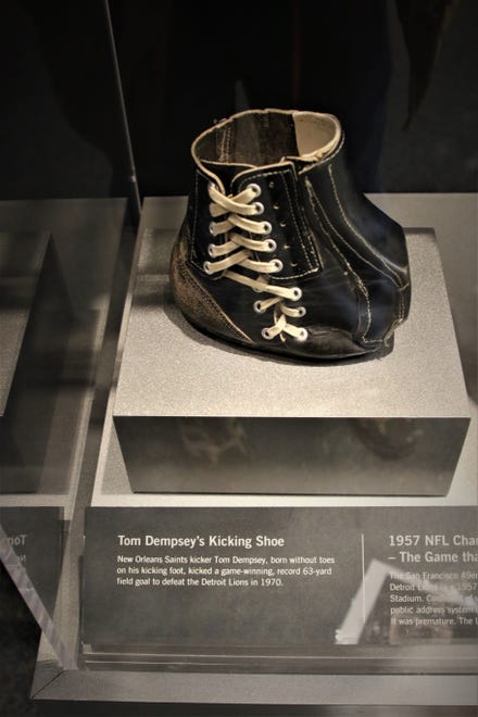 A modified shoe worn by New Orleans Saints kicker Tom Dempsey when he booted a record-setting 63-yard field goal in 1970 is part of the "Gridiron Glory" exhibition.