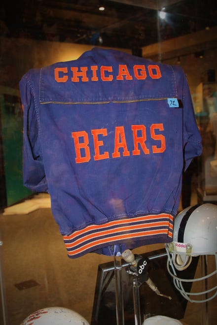A Chicago Bears warm-up jacket worn by actor James Caan in the film "Brian's Song" and a microphone from the early days of "Monday NIght Football" are featured in the "Gridiron Glory" exhibition.
