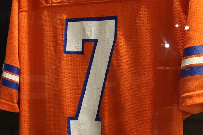 A John Elway jersey is featured as part of the "Gridiron Glory" exhibition at the Farmington Museum at Gateway Park.