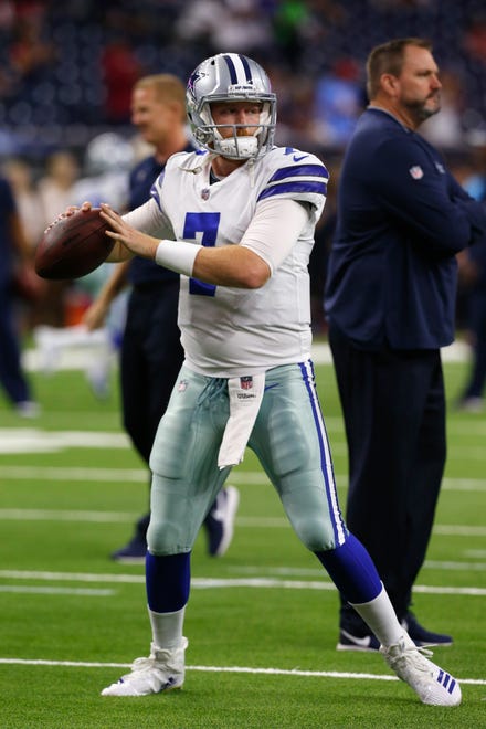 Cooper Rush #7 of the Dallas Cowboys warms up before the game against the Houston Texans at NRG Stadium on October 7, 2018 in Houston, Texas.