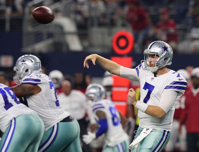Cooper Rush #7 of the Dallas Cowboys passes the ball against the Arizona Cardinals in a preseason football game at AT&T Stadium on August 26, 2018 in Arlington, Texas.
