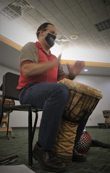 Instructor Teun Fetz leads his African drumming class in an exercise on Aug. 24, 2020, on the San Juan College campus in Farmington.