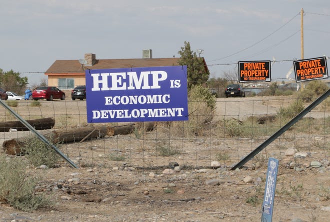 A sign along U.S. Highway 64 in Hogback shows support for growing hemp on Sept. 16.