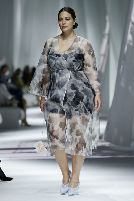 Ashley Graham walks the runway at the Fendi fashion show