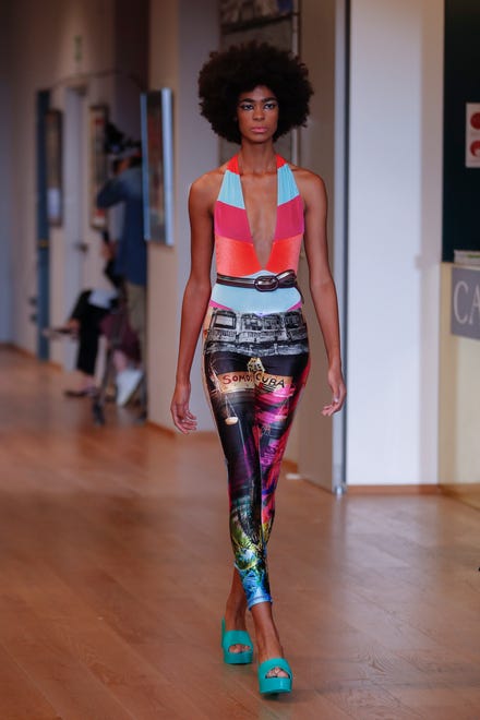 A model wears a creation from Francesco Liberatore ' s 2021 women ' s spring/summer ready-to-wear collection on Sept. 25.
