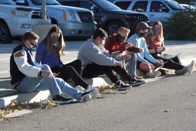 A group of students participate in a protest, Monday, Oct. 12, 2020, at Bloomfield High School.