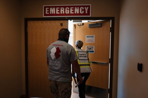 Team Rubicon Greyshirts Scott Nargis and Christa McDermont are deployed to the Gallup Indian Medical Center near the Navajo Nation to help with COVID-19 relief efforts. Greyshirts are supporting the medical center staff in emergency rooms, as EMTs, and vaccine distribution.