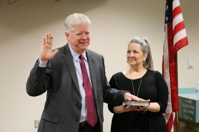 Gary Risley takes the oath of office, Monday, Jan. 4, 2021, in the San Juan County Commission chambers in Aztec.