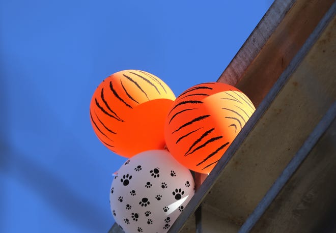Balloons are displayed on the bridge over the Animas River on West Aztec Boulevard prior to the start of Aztec High School's first home football game.