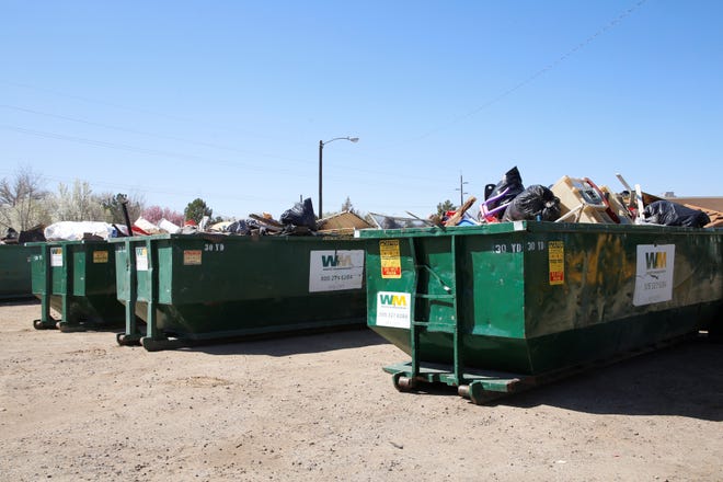 Dumpster are filled with debris during the City of Farmington's Spring Dumpster Weekend on April 10 at Berg Park in Farmington.
